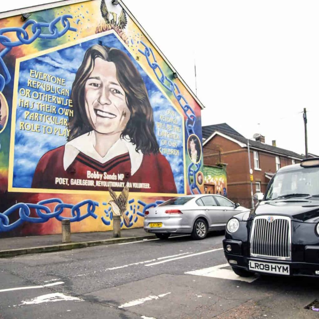 Large republican mural on the Falls Road depicting Irish history